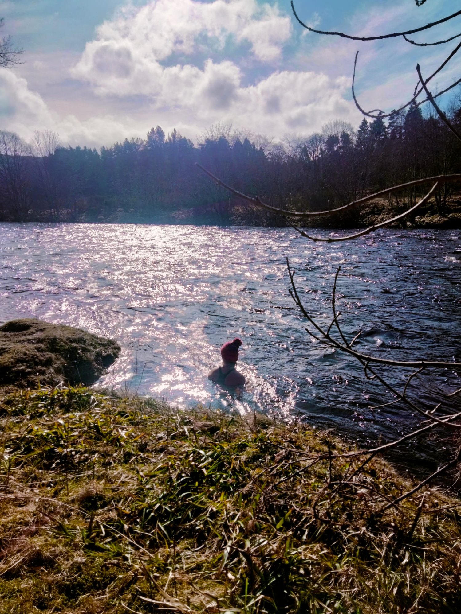 Erica Stanford in an icy Scottish river during winter cold immersion training